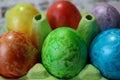 Colorful easter eggs in a egg carton box close up Royalty Free Stock Photo