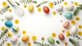 Colorful Easter eggs and flowers arranged in a circle with a whisk on a white background Royalty Free Stock Photo
