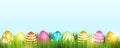 Colorful Easter eggs on fresh green grass, isolated on a light background. Space for the text. Vector Royalty Free Stock Photo