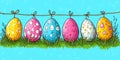 Colorful Easter Eggs Hanging on a String in Grass Festive Spring Holiday Decoration Royalty Free Stock Photo