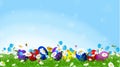 Colorful Easter eggs and l spring flowers. Royalty Free Stock Photo