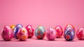 Colorful Easter eggs on pink background, greeting Easter card