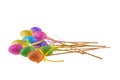 Colorful easter eggs on sticks isolated white