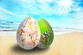 Colorful easter eggs on sunny beach