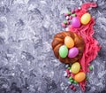 Colorful Easter eggs and wicker bread Royalty Free Stock Photo
