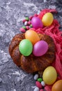 Colorful Easter eggs and wicker bread Royalty Free Stock Photo