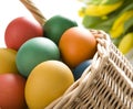 Colorful easter eggs in wooden bowl Royalty Free Stock Photo