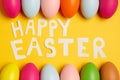 Colorful Easter eggs on a yellow background Royalty Free Stock Photo