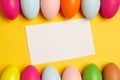 Colorful Easter eggs on a yellow background Royalty Free Stock Photo