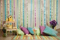 Colorful easter home interior with striped background