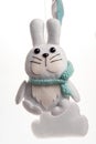 Colorful and eco-friendly children`s mobile from felt. A felt toy in the form of a lovely rabbit , part of a children`s mobile.