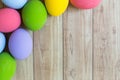 Colorful Eggs on Wooden Background