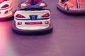 Colorful electric bumper car in autodrom in the attractions at amusement park Royalty Free Stock Photo