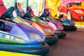 Colorful electric bumper car in the fairground attractions at amusement park