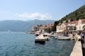 Embankment of the resort town of Perast, Adriatic Sea, Bay of Kotor, Montenegro, Europe. Royalty Free Stock Photo