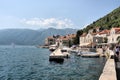 Embankment of the resort town of Perast on the coast of Boca - Kotor Bay, Adriatic Sea, Montenegro, Europe. Royalty Free Stock Photo