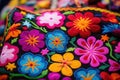 Colorful embroidery on a traditional handcraft, close up, ÃÂolorful embroidered decorative textile from Otavalo Royalty Free Stock Photo