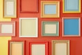 Colorful Empty Picture Frames on Wall in Living Space Royalty Free Stock Photo