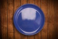 Colorful empty plate on grungy background table Royalty Free Stock Photo