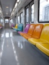 Colorful empty seats in a modern subway train. Royalty Free Stock Photo