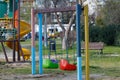 Colorful empty swing. Royalty Free Stock Photo
