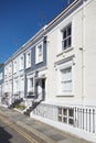 Colorful English houses facades, blue sky in London Royalty Free Stock Photo