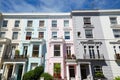 Colorful English houses facades in London, blue sky Royalty Free Stock Photo