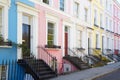Colorful English houses facades in a row in London