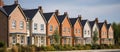 Colorful English style terraced houses. Concept of suburban life.