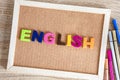 A colorful ENGLISH word alphabet on pin board background ,English language learning concept Royalty Free Stock Photo