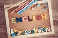 Colorful ENGLISH word alphabet on a pin board background ,English language learning concept Royalty Free Stock Photo