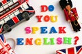 Colorful english words DO YOU SPEAK ENGLISH with souvenirs from London,English language learning concept Royalty Free Stock Photo