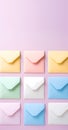 Colorful envelopes on pastel background