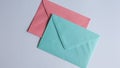 Colorful envelopes on white