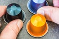 colorful espresso coffee doses in hand Royalty Free Stock Photo