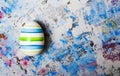 Colorful Ester egg on blue background Royalty Free Stock Photo