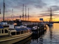 Colorful evening sky in Oslo, Norway. Modern and vintage ships.