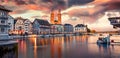 Colorful evening view of Grossmunster Church. Great autumn cityscape of Zurich, Switzerland, Europe. Royalty Free Stock Photo