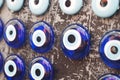 Colorful evil eye beads displayed on a textured surface Royalty Free Stock Photo