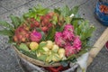 Colorful exotic fruits basket, containing Dragon fruits, Rambutan and pears Royalty Free Stock Photo