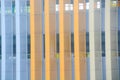 The colorful expanded metal facade cladding of the building adds a vibrant and modern touch to its architectural design