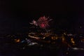 Colorful Explosions of Festive Fireworks Illuminate the Night Sky Valmiera. Colorful exploding fireworks light up the night sky