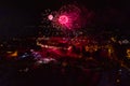 Colorful Explosions of Festive Fireworks Illuminate the Night Sky Valmiera. Colorful exploding fireworks light up the night sky