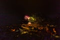 Colorful Explosions of Festive Fireworks Illuminate the Night Sky Valmiera. Colorful exploding fireworks light up the night sky