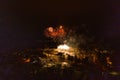 Colorful Explosions of Festive Fireworks Illuminate the Night Sky Valmiera. Colorful exploding fireworks light up the night sky