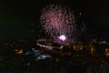 Colorful Explosions of Festive Fireworks Illuminate the Night Sky Valmiera. Colorful exploding fireworks light up the night sky