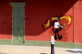 Colorful exterior of building with painted cat playing instrument, New Orleans, 2016