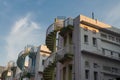 Colorful exterior spiral staircases against blue sky, Singapore