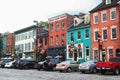 Historic buildings line cobblestone streets in Fells Point, Baltimore MD