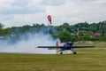 Colorful Extra EA-300 airplane model at Hangariada aeronautical festival show